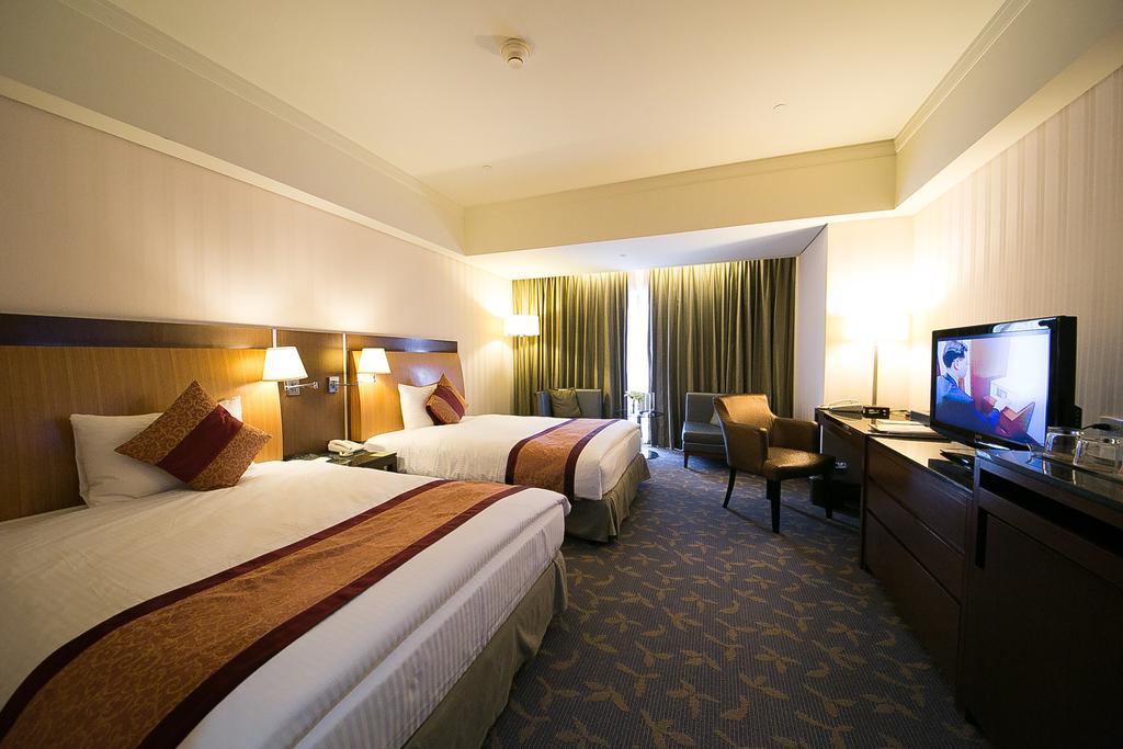 เอเวอร์กรีน พลาซ่า โฮเต็ล Hotel ไถหนาน ห้อง รูปภาพ Deluxe Room