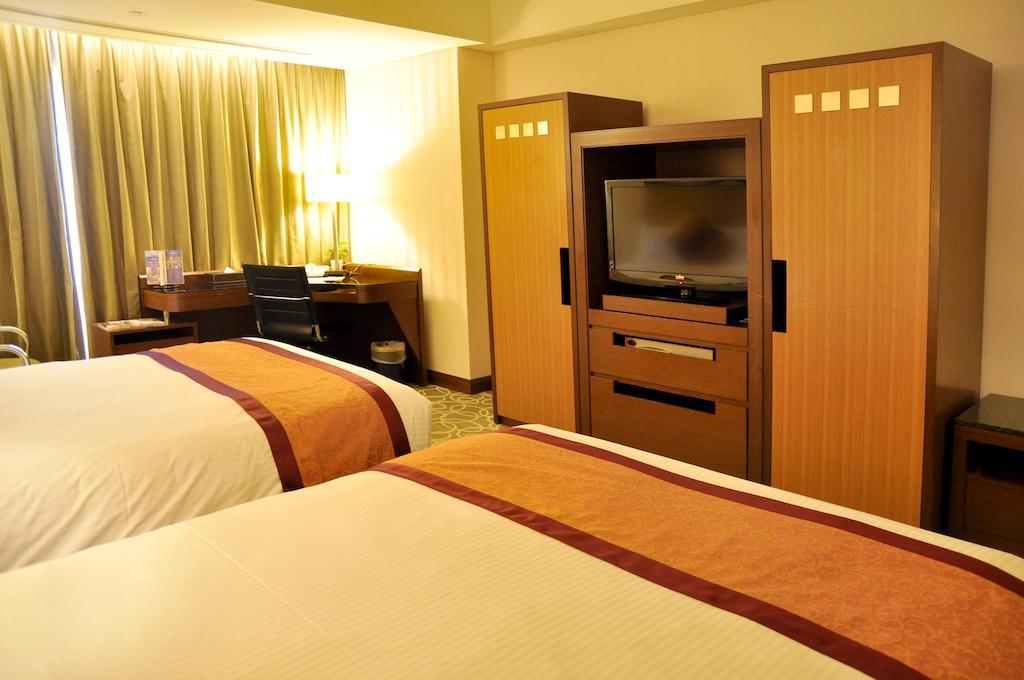 เอเวอร์กรีน พลาซ่า โฮเต็ล Hotel ไถหนาน ห้อง รูปภาพ Deluxe room