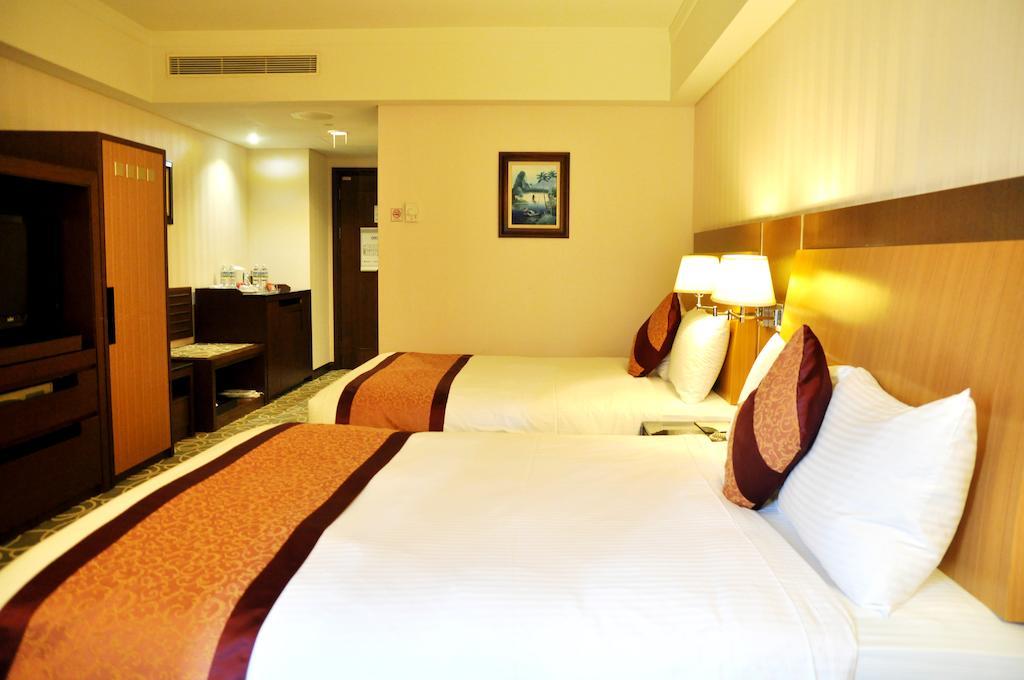เอเวอร์กรีน พลาซ่า โฮเต็ล Hotel ไถหนาน ห้อง รูปภาพ Deluxe Room